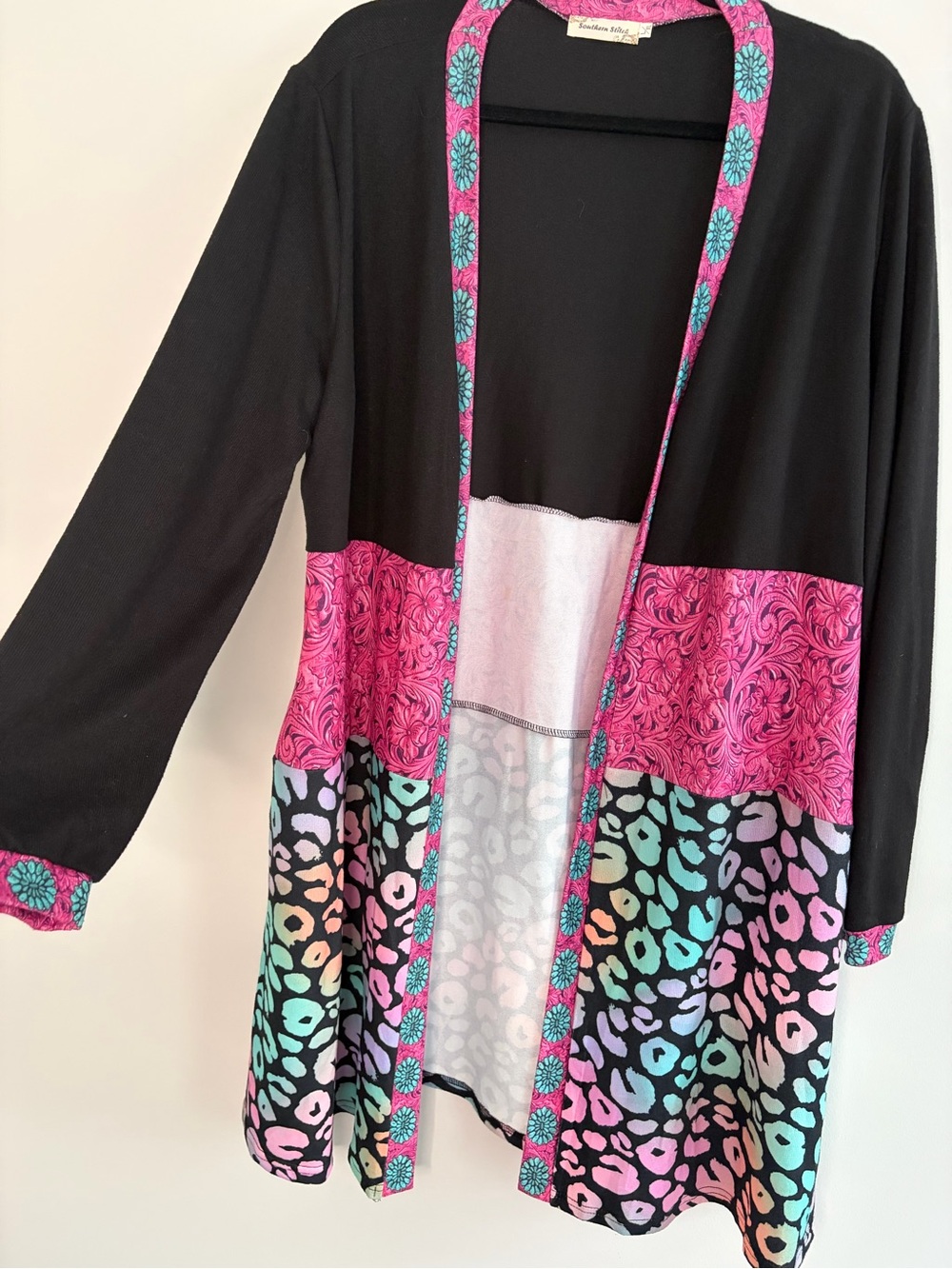 Black Open-Front Cardigan with Multicolor Animal-Print Hem - Picture 2 of 4